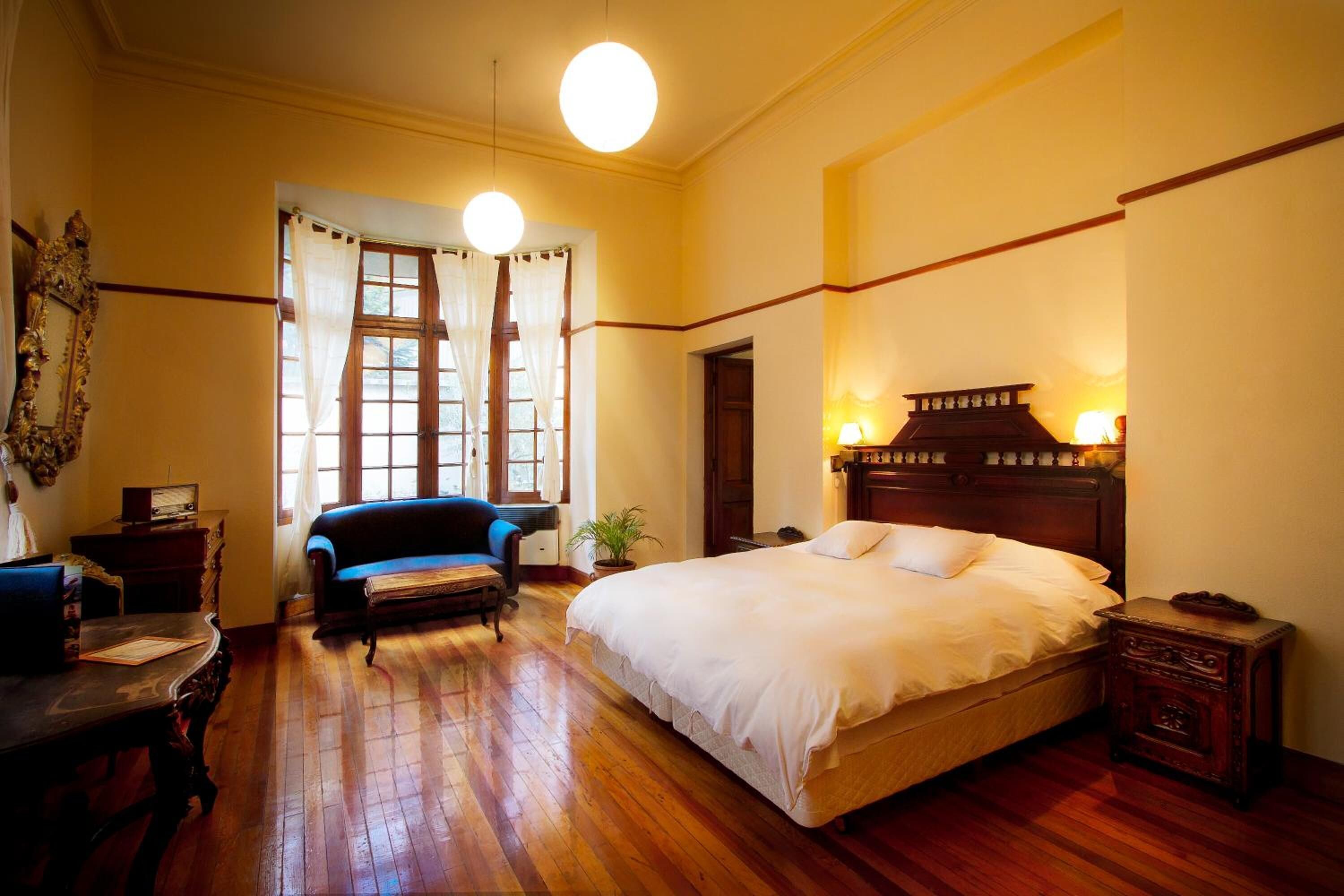 down duvets, pillow-top beds, in-room safe, individually decorated