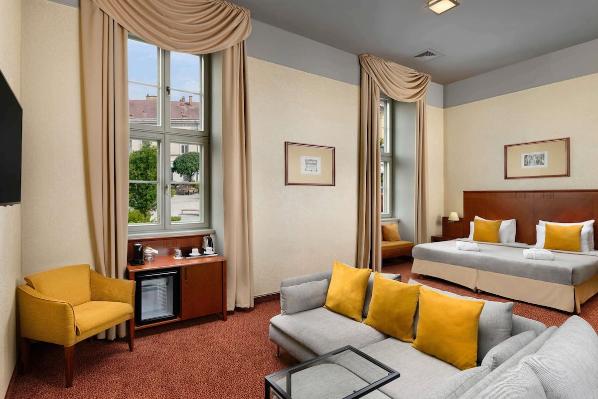 Junior Suite, Multiple Beds | In-room safe, desk, laptop workspace, blackout curtains