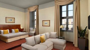Junior Suite, Multiple Beds | In-room safe, desk, laptop workspace, blackout drapes