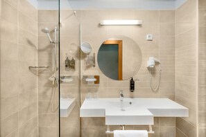 Eco-friendly toiletries, hair dryer, towels, soap