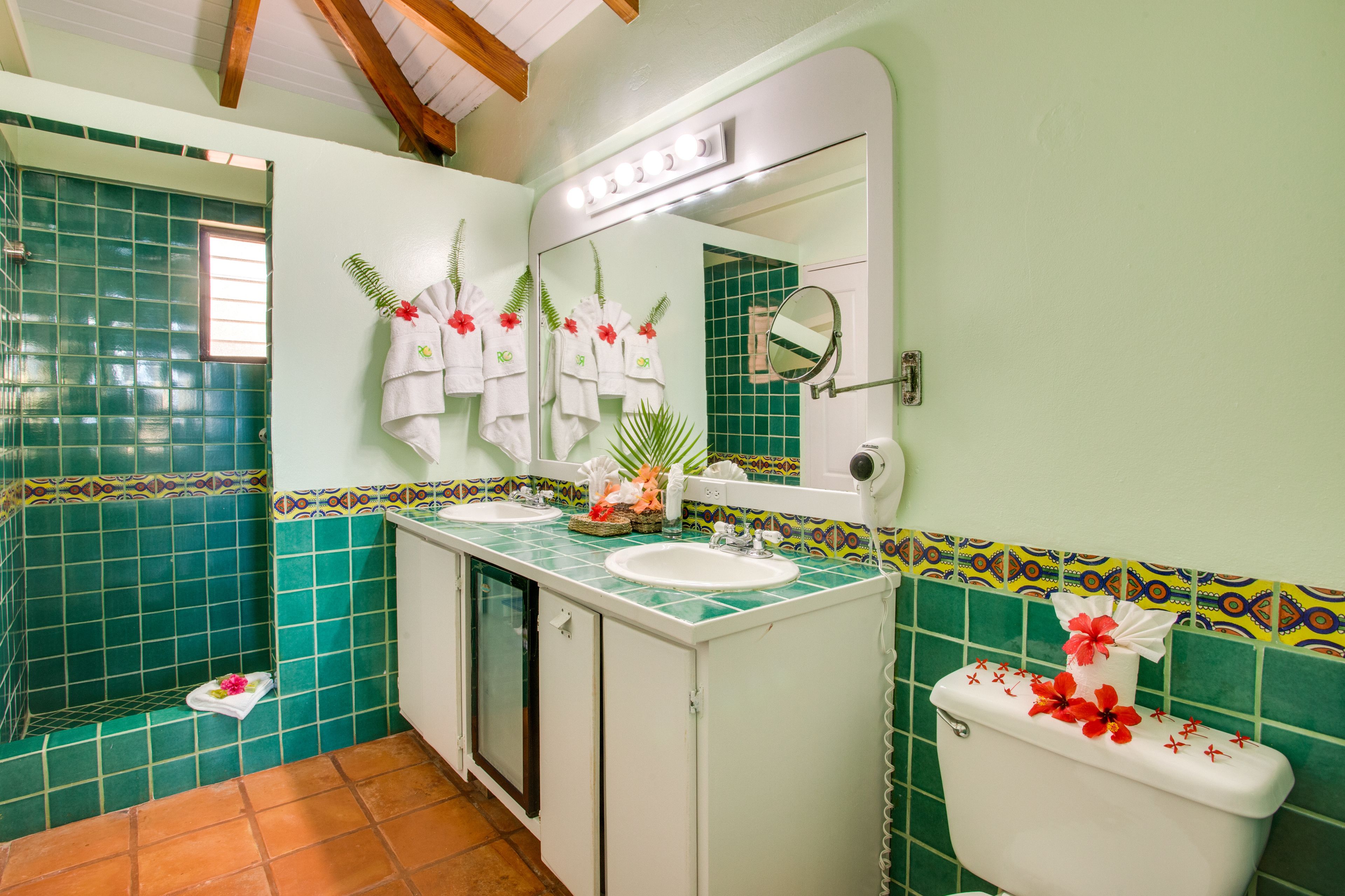 shower, hair dryer, dressing gowns, towels