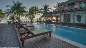 Outdoor pool, open 9:00 AM to 9:00 PM, pool loungers