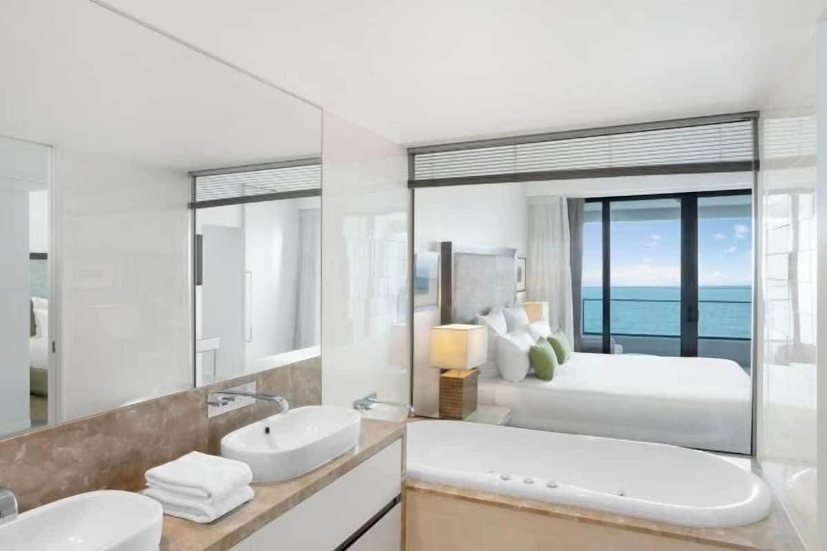 Shower, designer toiletries, hair dryer, bathrobes