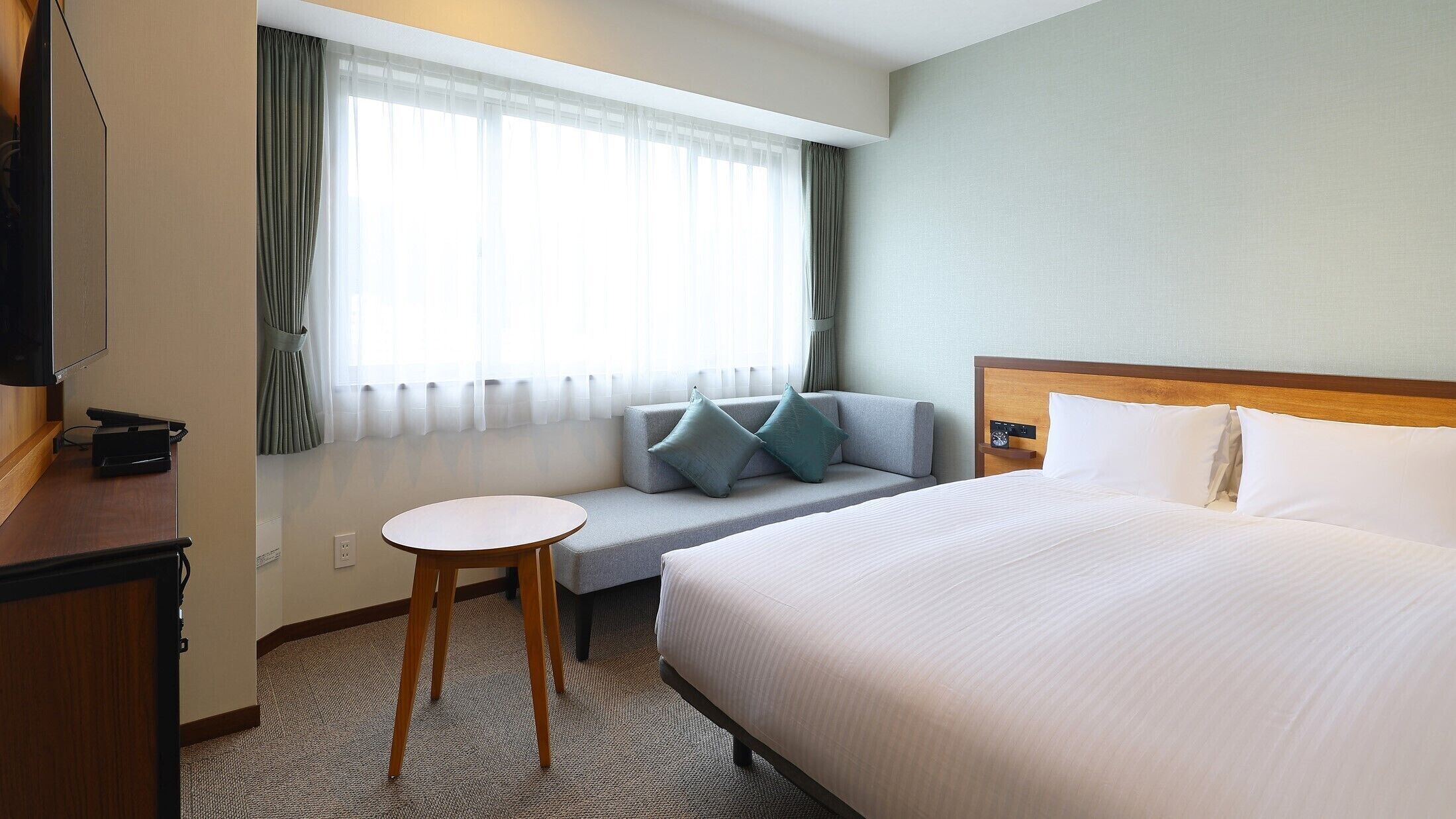 Premium bedding, down comforters, Select Comfort beds, in-room safe