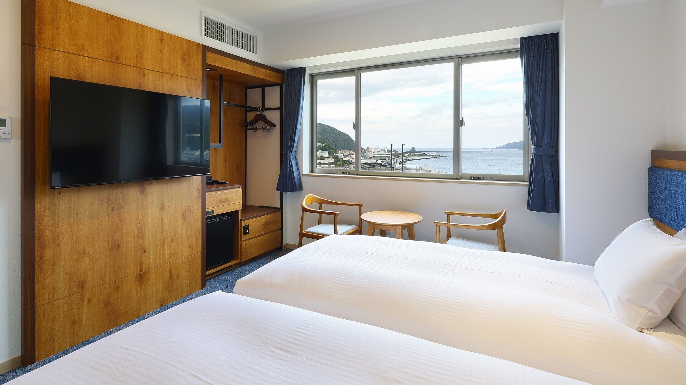 Premium bedding, down comforters, Select Comfort beds, in-room safe