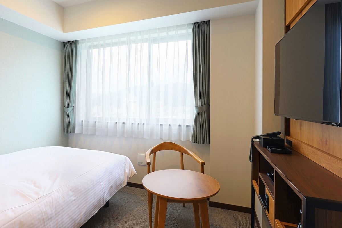 Premium bedding, down comforters, Select Comfort beds, in-room safe