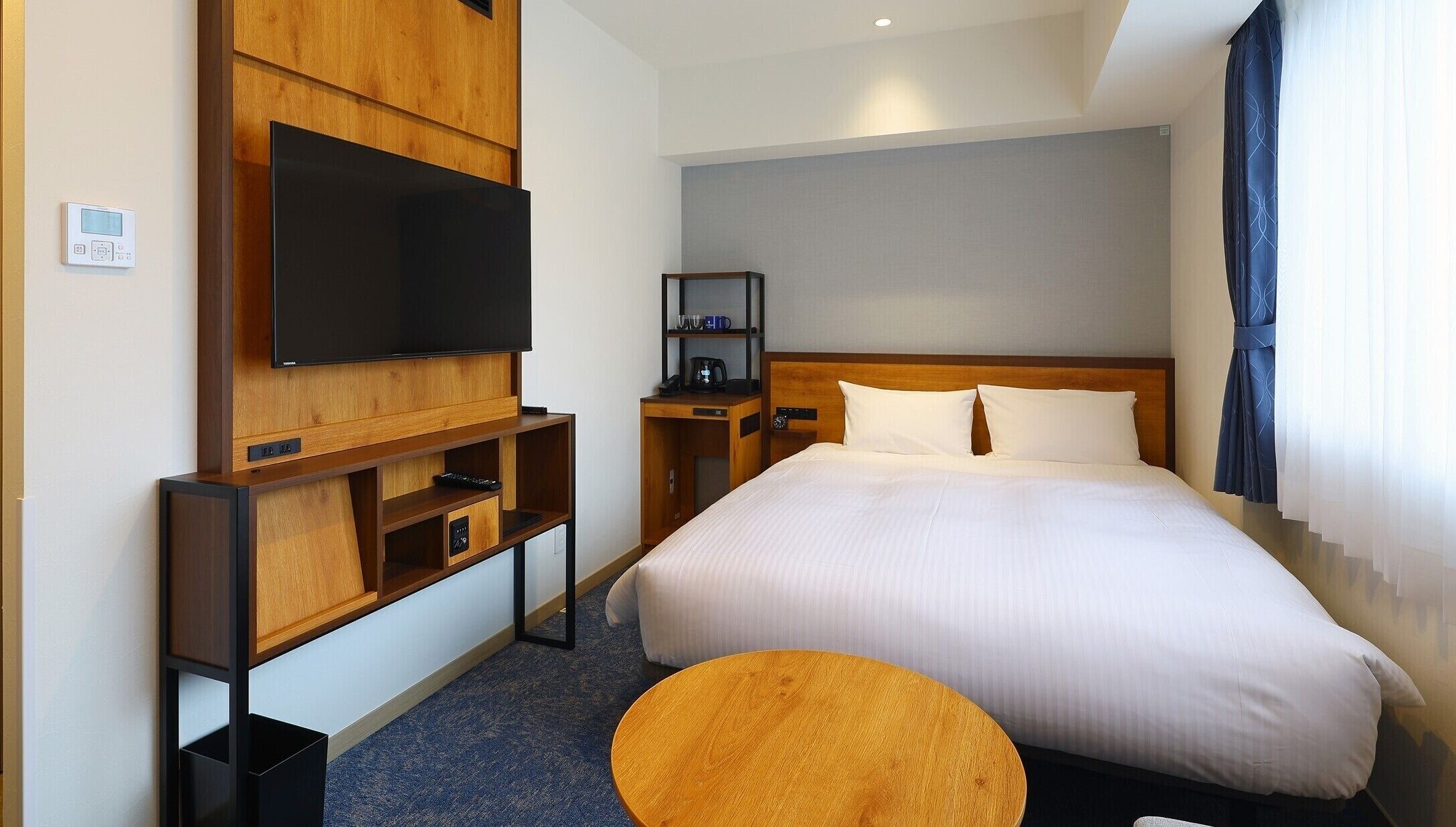 Premium bedding, down comforters, Select Comfort beds, in-room safe