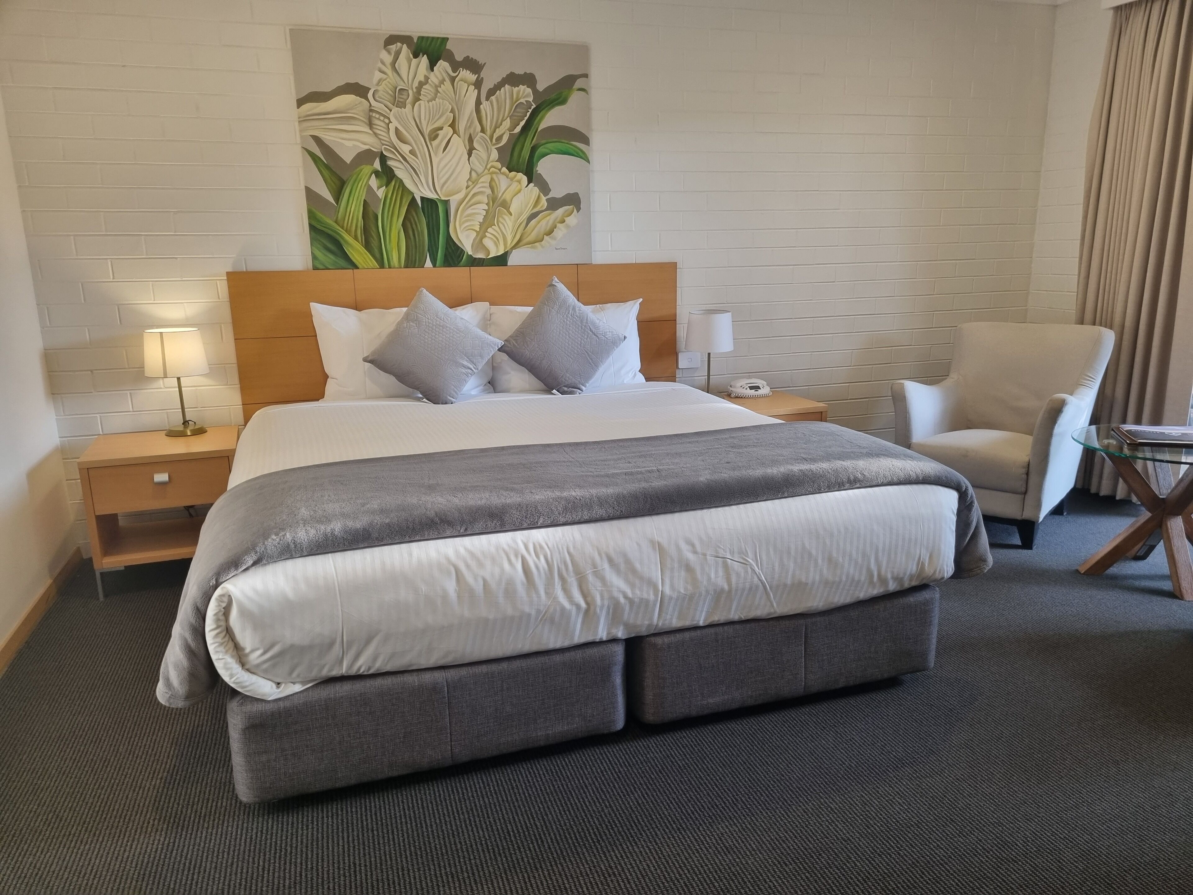 Premium bedding, desk, blackout drapes, iron/ironing board