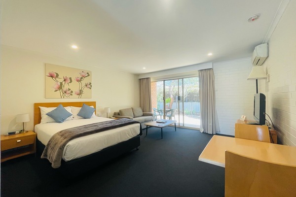 Premium bedding, desk, blackout drapes, iron/ironing board