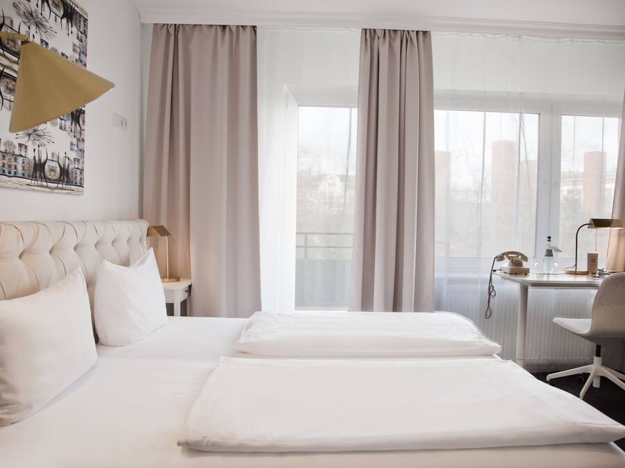 Ropa de cama hipoalergénica y minibar