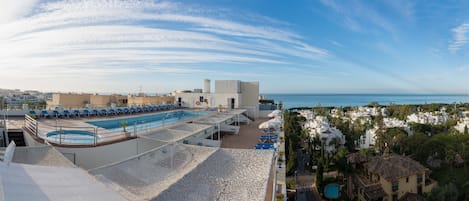 Seasonal outdoor pool, pool umbrellas, sun loungers