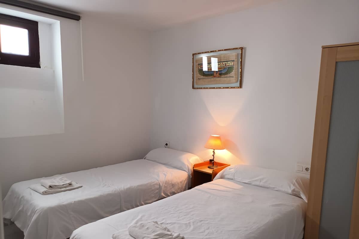 Family Duplex | Premium bedding, blackout drapes, free WiFi, bed sheets