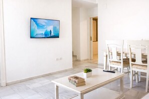 Comfort maisonnette | Woonruimte | Flatscreentelevisie