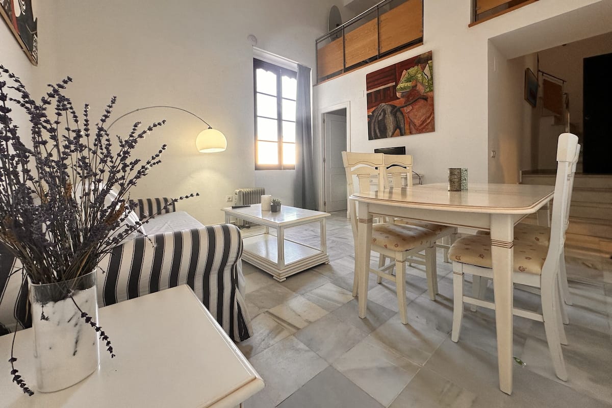 Comfort maisonnette | Woonruimte | Een flatscreentelevisie