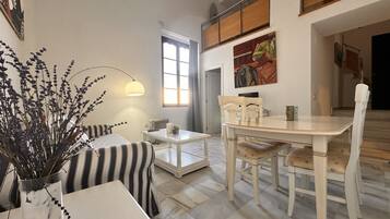 Comfort Duplex | Living area | Flat-screen TV