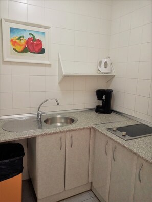 Standard Penthouse, Terrace | Private kitchen | Full-sized fridge, microwave, coffee/tea maker, electric kettle - Apartamentos Larga 70 (El Puerto de Santa Maria)