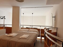 Comfort Duplex | Premium bedding, blackout drapes, free WiFi, bed sheets