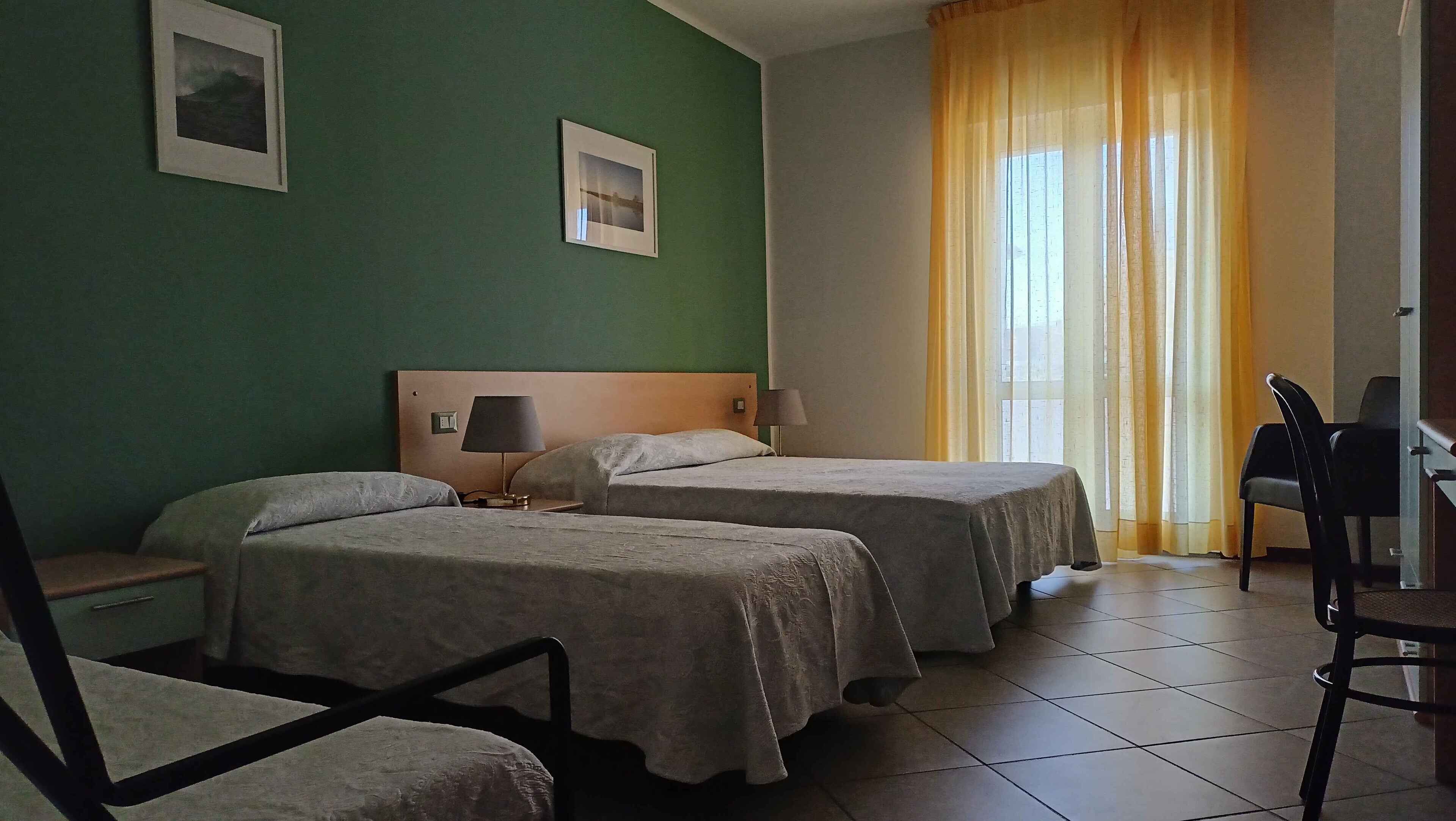 Quadruple Room, Balcony | Minibar, in-room safe, desk, free WiFi