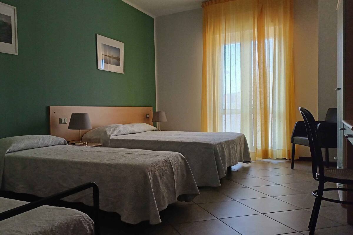 Quadruple Room, Balcony | Minibar, in-room safe, desk, free WiFi