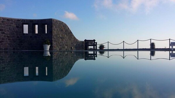 2 outdoor pools, open 9:00 AM to 9:00 PM, pool umbrellas, sun loungers