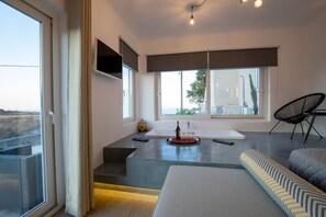 Junior Suite with Terrace, hot tub  Pool & Sea View