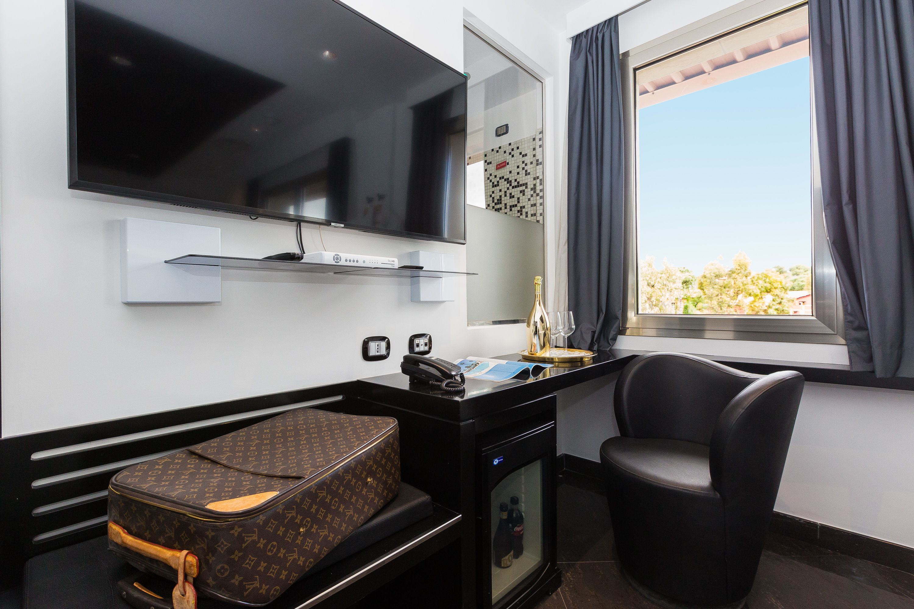 premium bedding, free minibar items, in-room safe