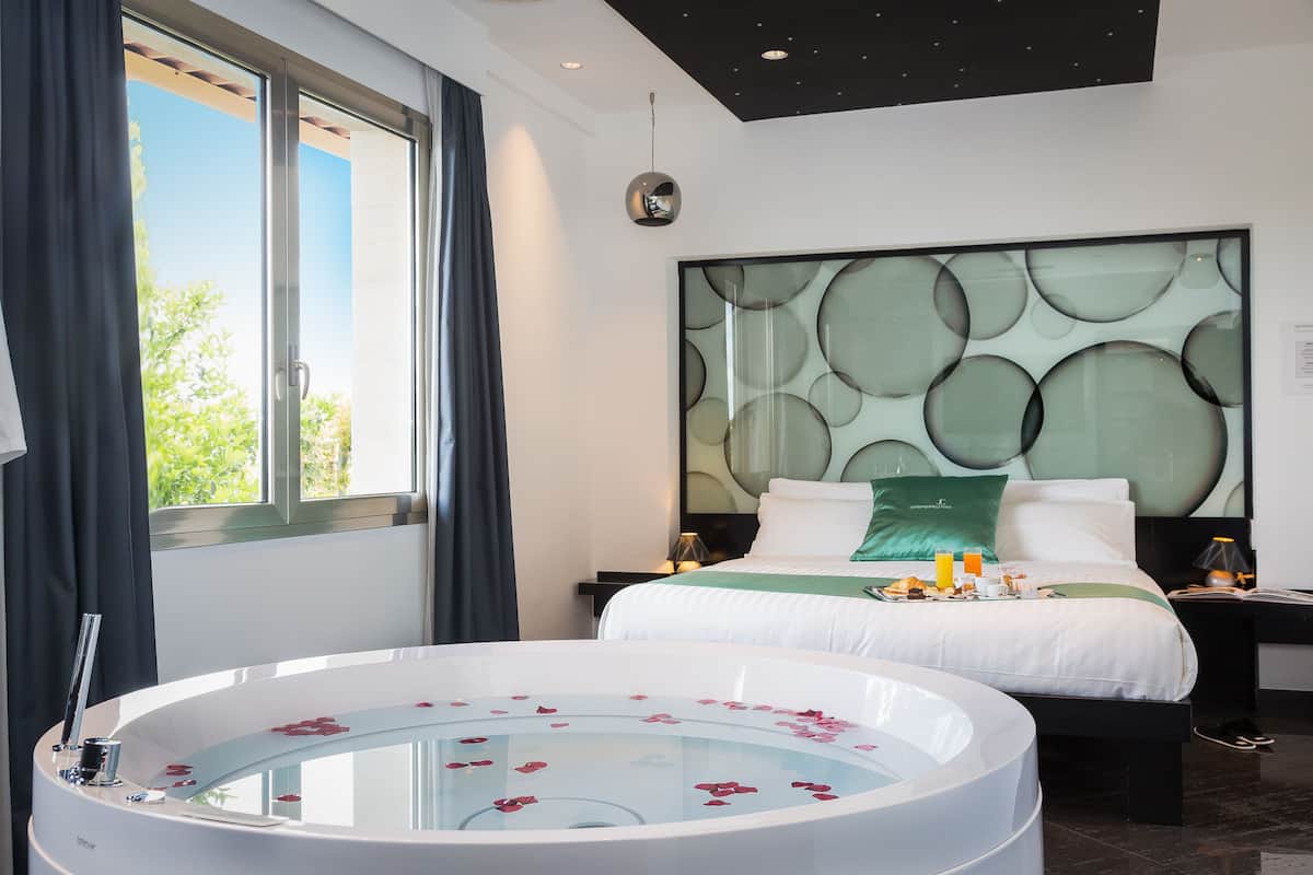 Premium bedding, free minibar items, in-room safe