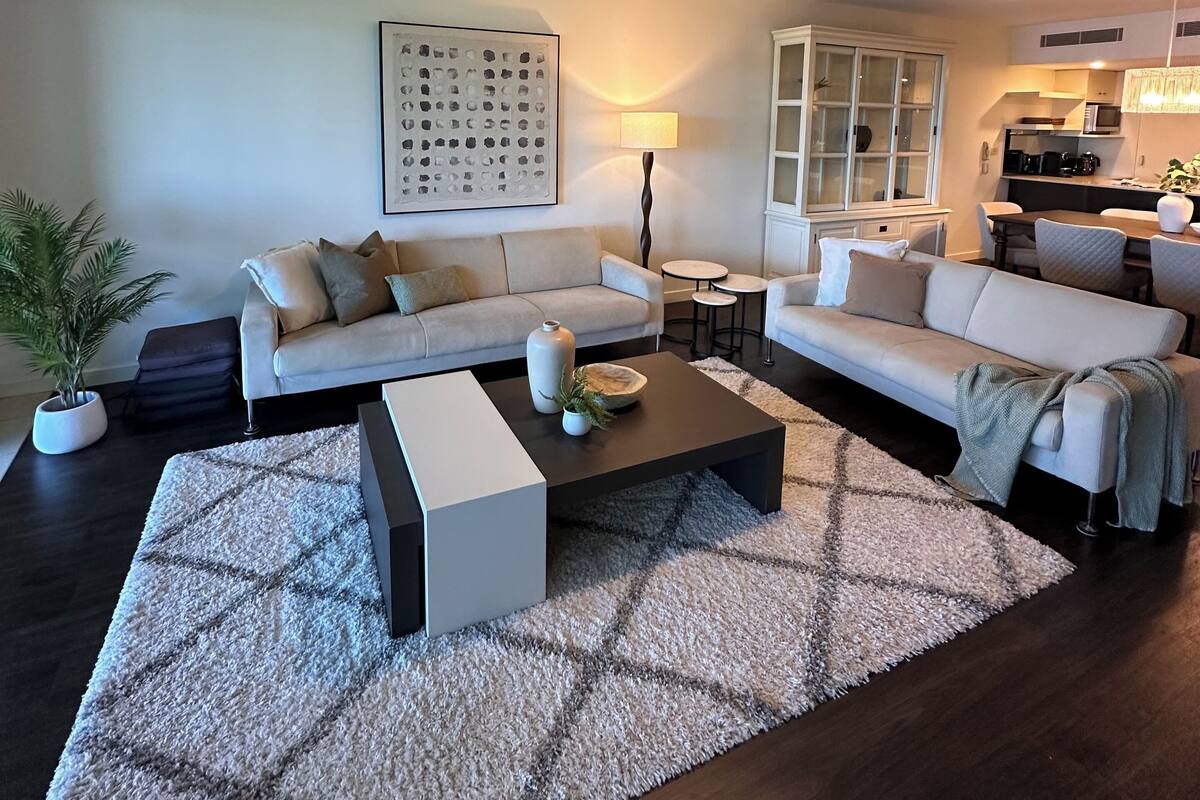 Deluxe Two Bedroom Apartment | Living area | LCD TV