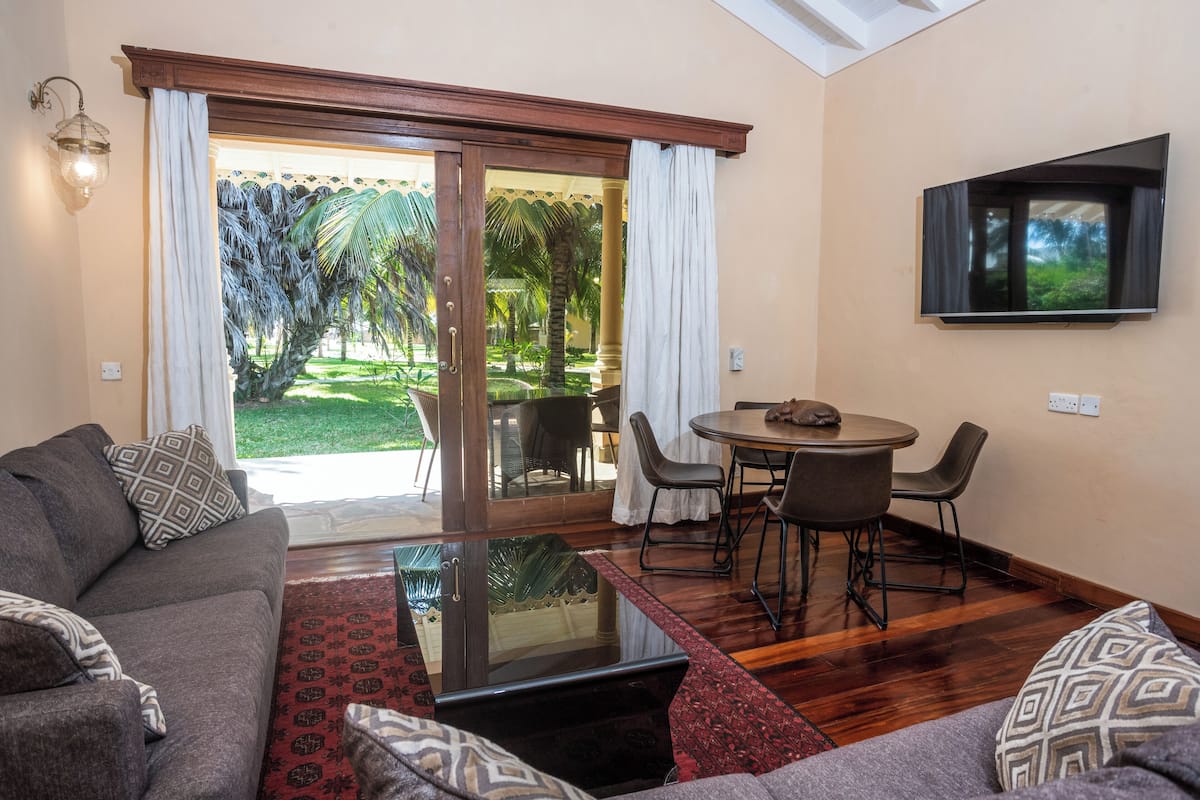 Family Villa, 2 Bedrooms, Garden View | Living area | 32-inch LCD TV with satellite channels, TV