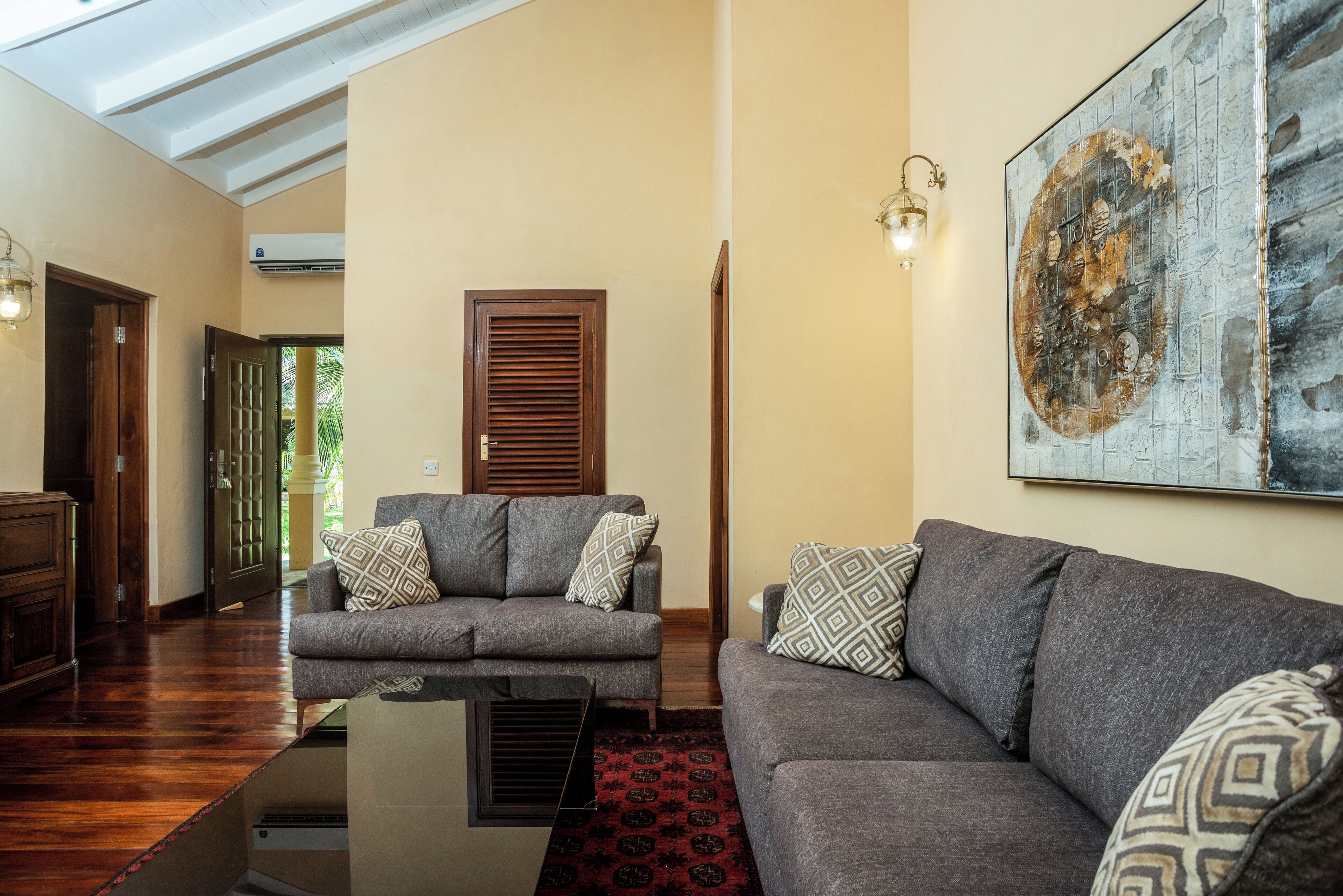 family villa, 2 bedrooms, garden view | living area | 32-inch lcd tv with satellite channels, tv