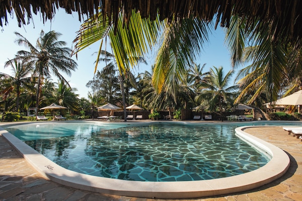 2 outdoor pools, open 7:00 AM to 6:30 PM, pool loungers