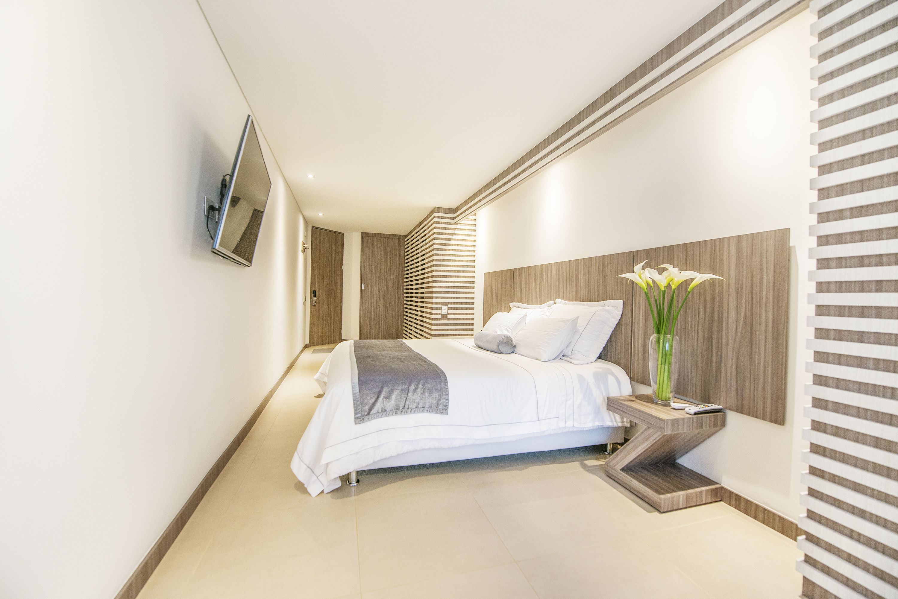 deluxe room | hypo-allergenic bedding, down duvets, minibar, in-room safe