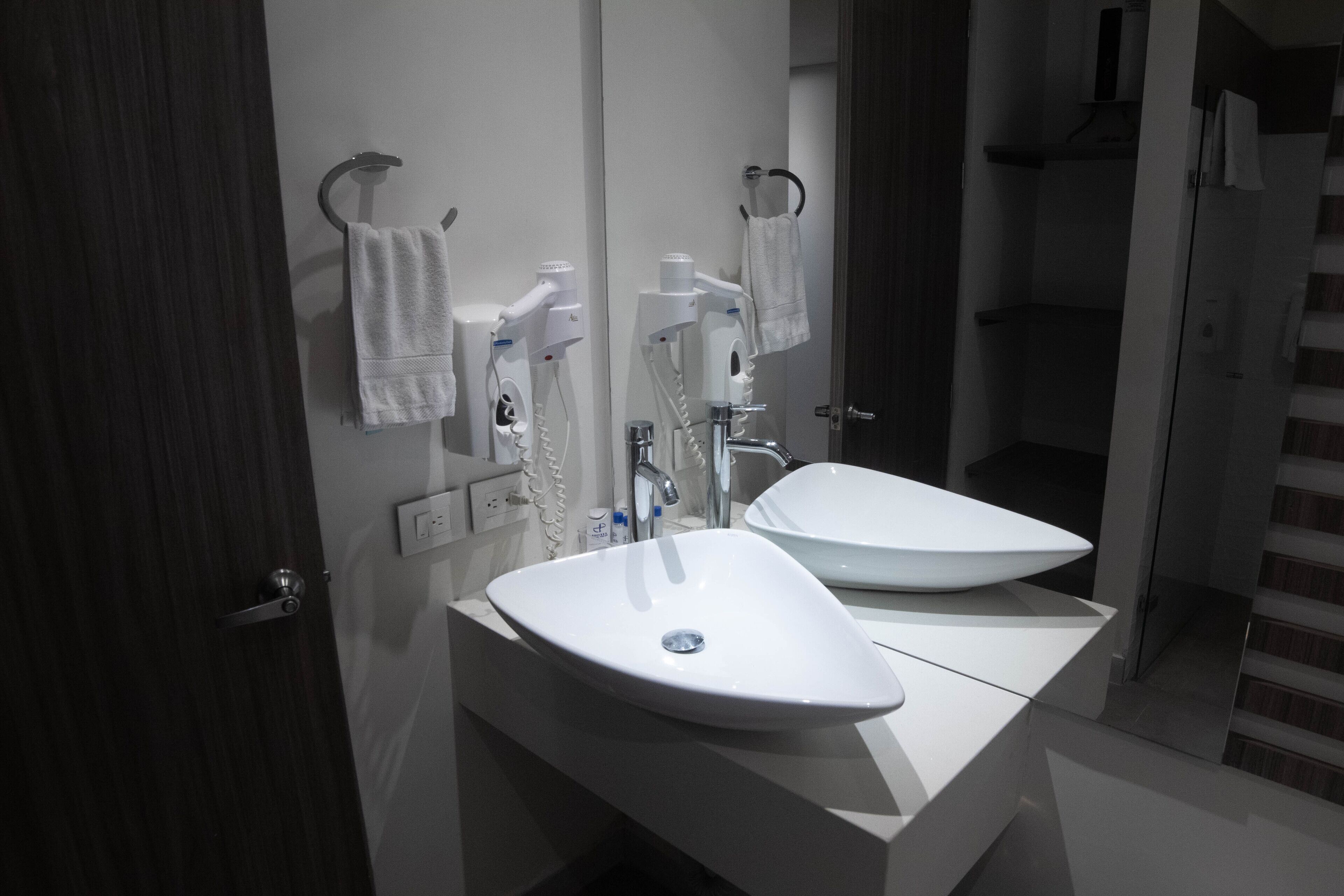 deluxe triple room | bathroom | shower, free toiletries, hair dryer, towels