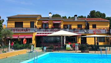 Outdoor pool, open 11:00 AM to 7:30 PM, lifeguards on site