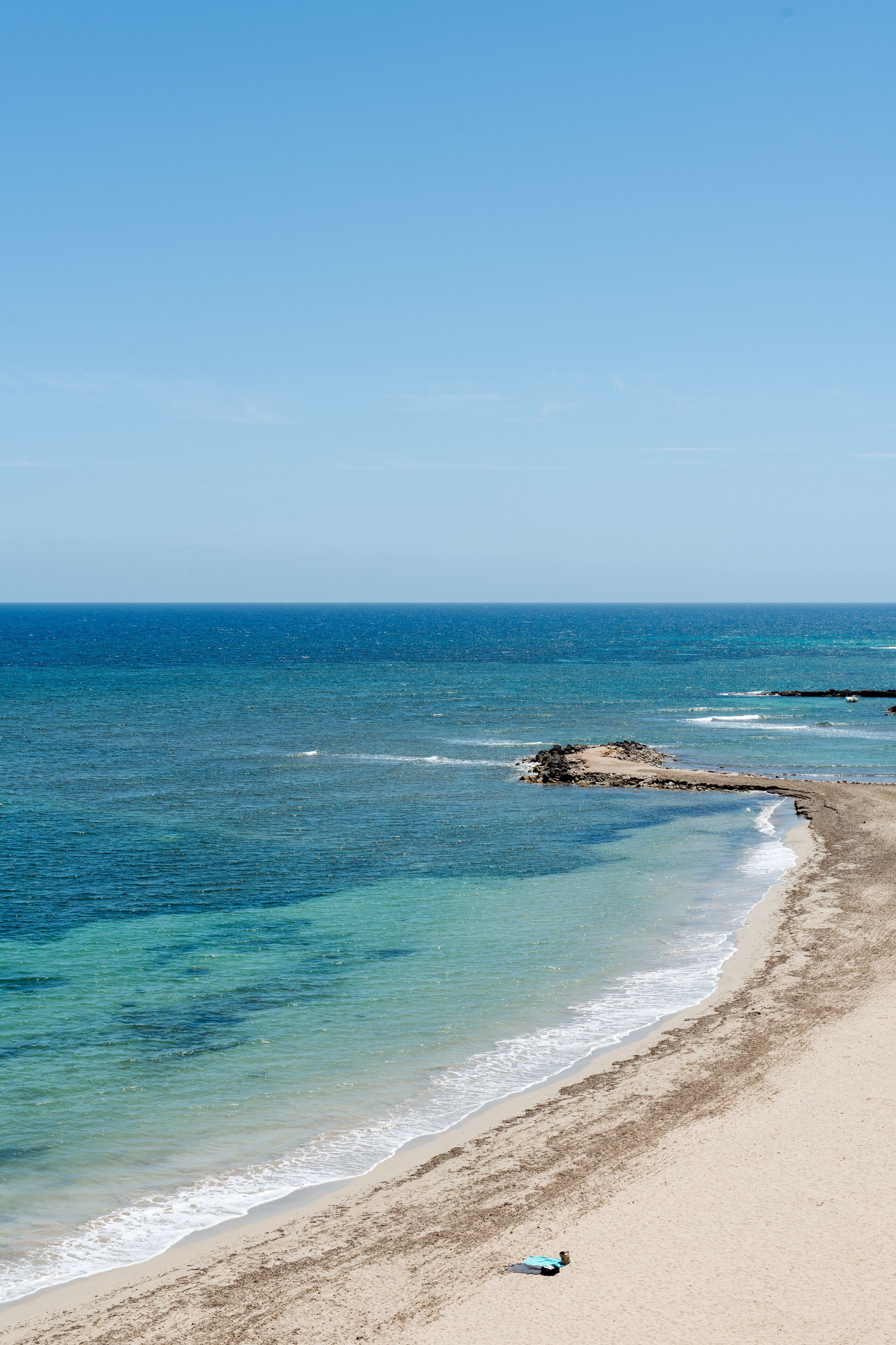 on the beach, white sand, sun-loungers, beach umbrellas