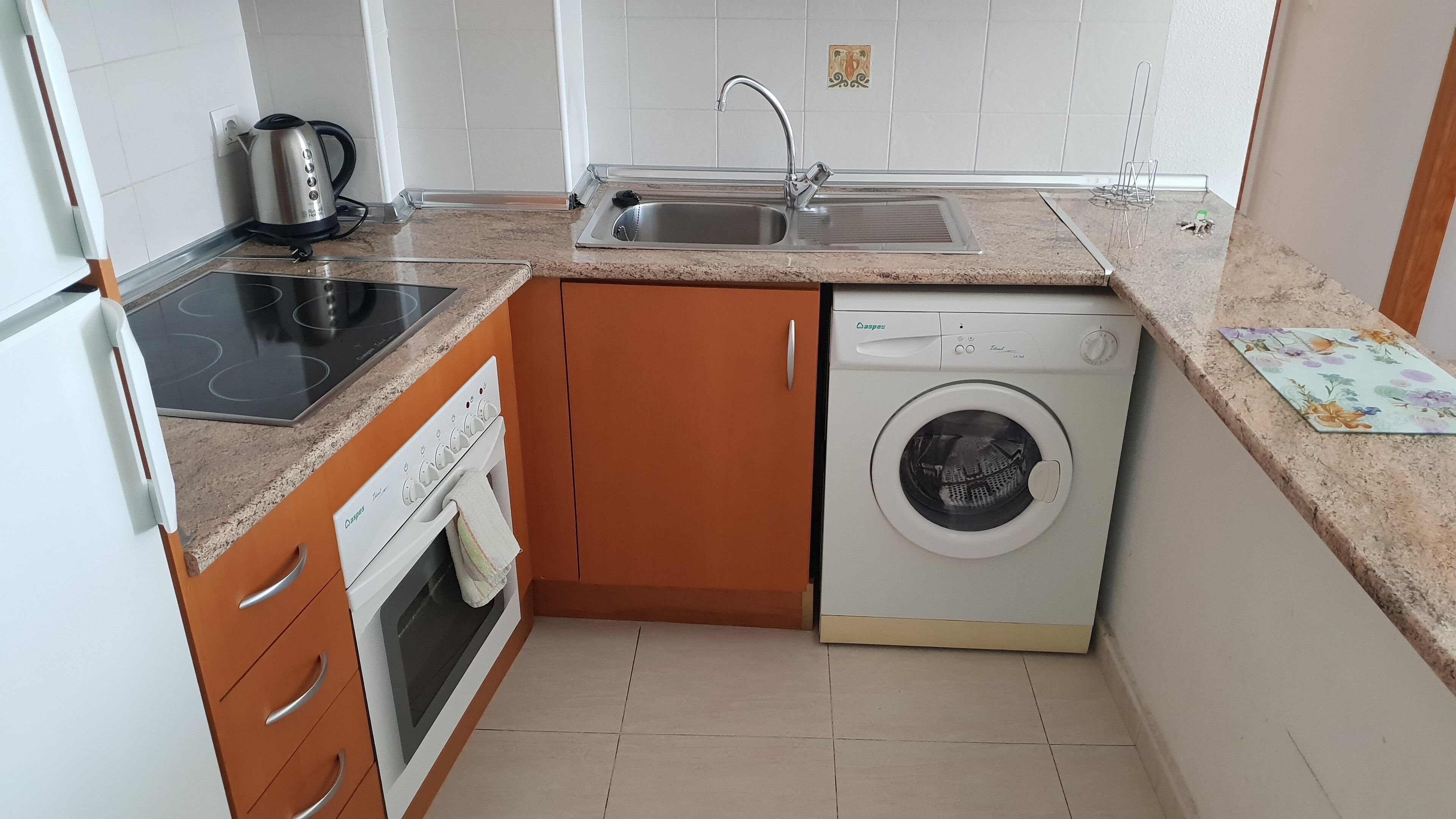 full-sized fridge, microwave, oven, stovetop