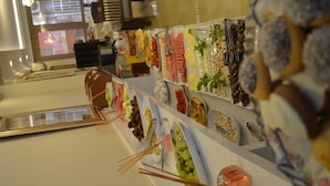 A buffet setup with various food items and utensils. - Hotel Blue Istanbul - Special class (Istanbul)