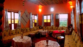 Breakfast, lunch, dinner served; local cuisine