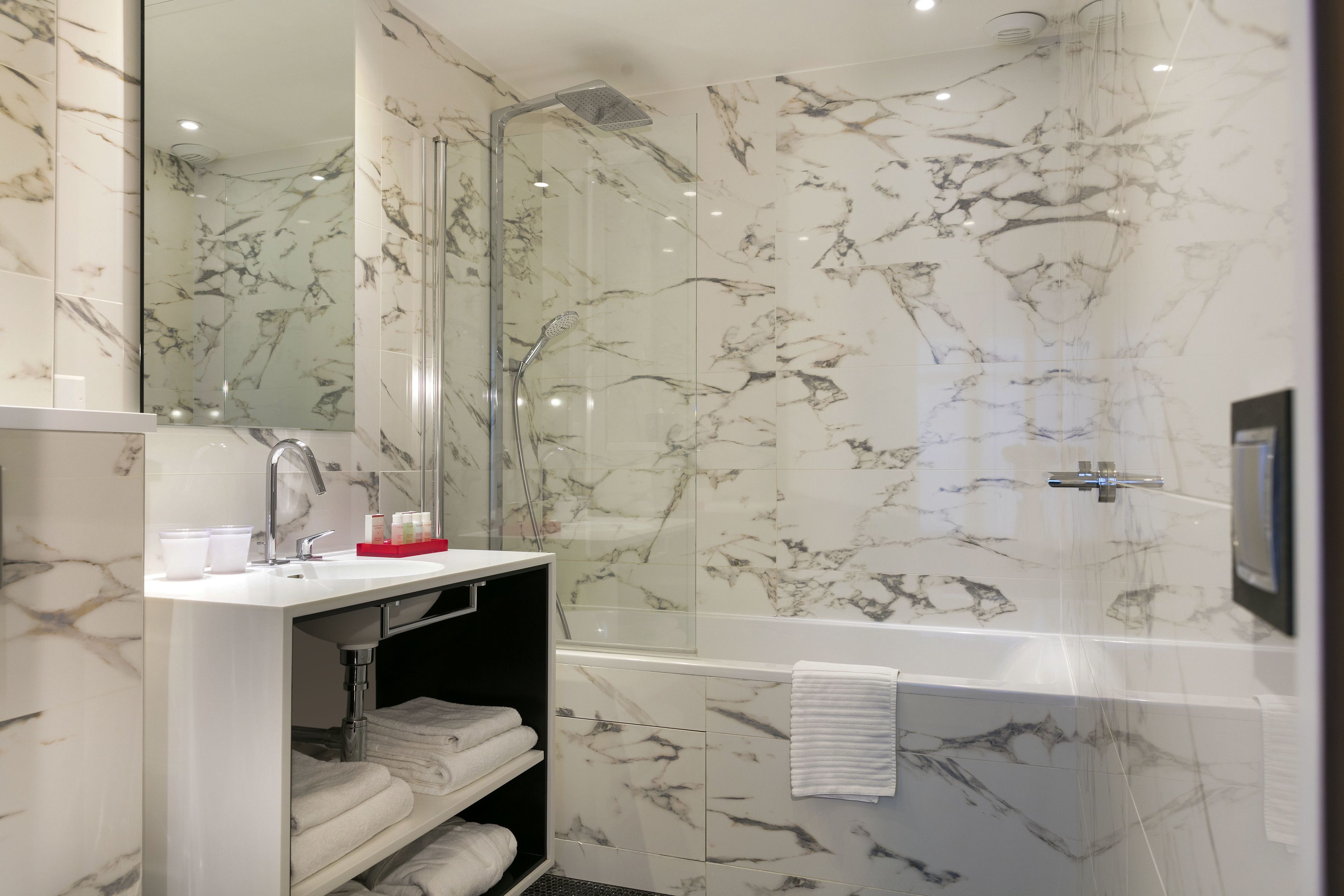 superior room | bathroom | designer toiletries, hair dryer, bathrobes, slippers
