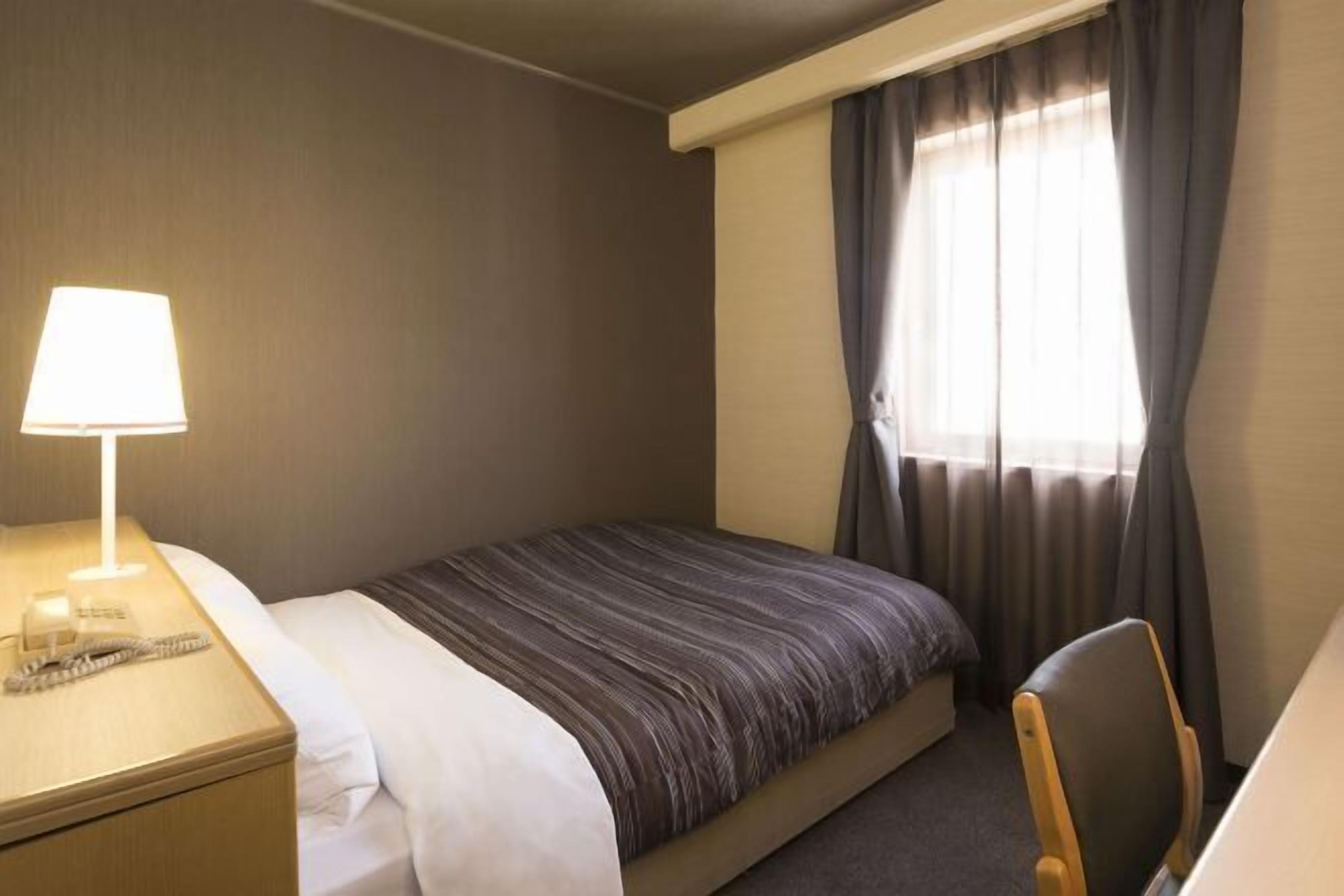 Blackout drapes, iron/ironing board, free WiFi, bed sheets