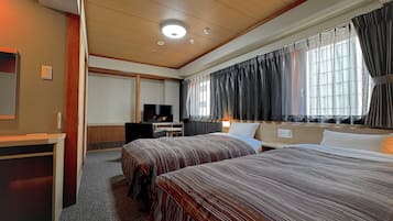 Blackout curtains, iron/ironing board, free WiFi, bed sheets