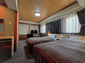Blackout drapes, iron/ironing board, free WiFi, bed sheets