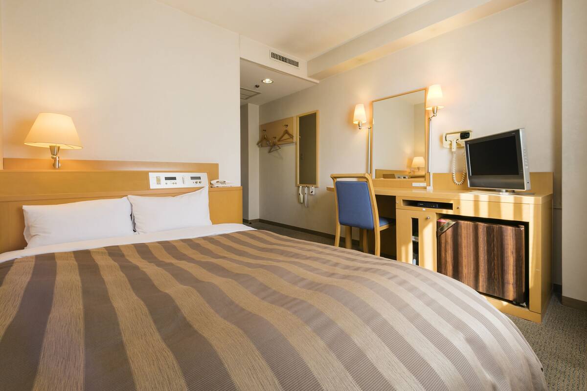 Desk, blackout drapes, iron/ironing board (on request), WiFi (free)