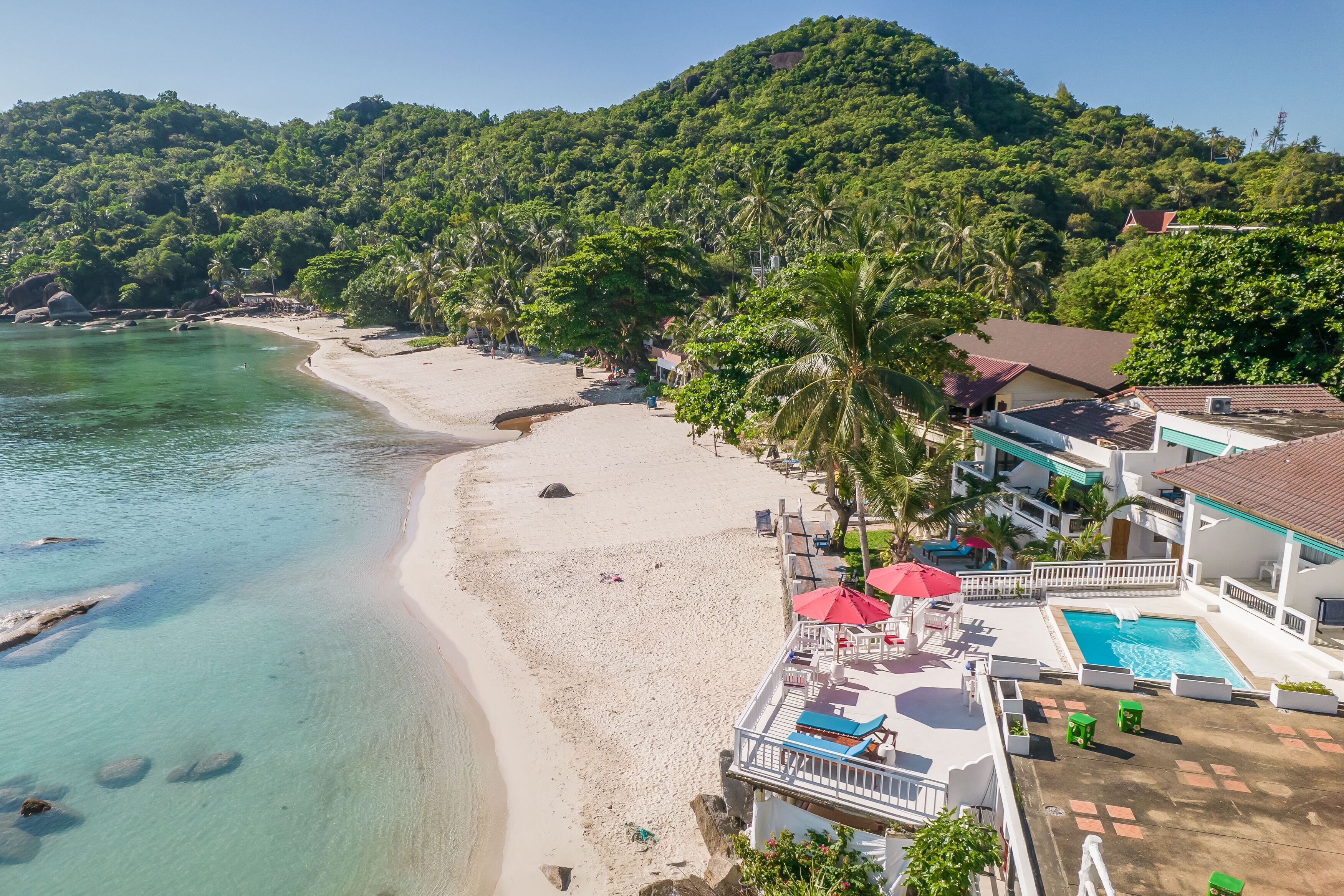 On the beach, white sand, beach towels, beach massages