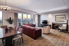 Design Apartment, 2 Bedrooms, Kitchenette | Living area | 55-inch TV with satellite channels, table tennis, streaming services