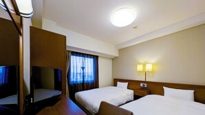 A hotel room with two beds, a desk, a TV, and a window with curtains. - Hotel Route - Inn Towada (Towada)