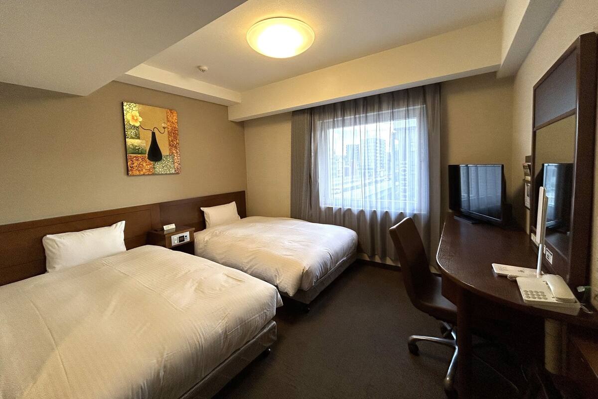 Desk, free WiFi, bed sheets