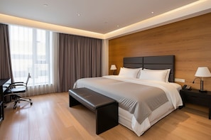 A modern hotel room with a large bed, a desk, and a chair. - The Westin Xian (Xi'an)