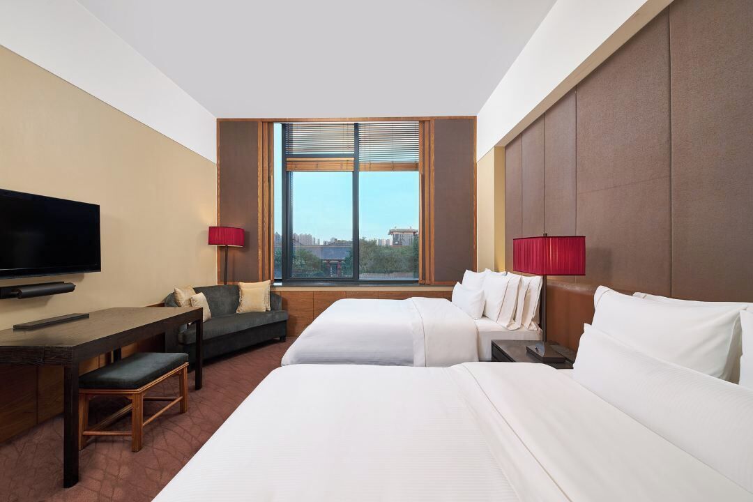 Premium bedding, memory foam beds, minibar, in-room safe