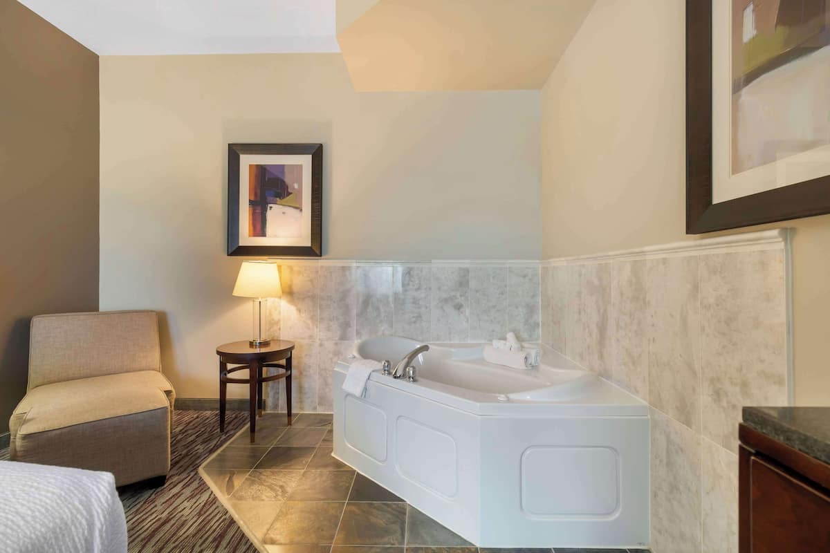 suite, 1 king bed, non smoking, jetted tub (with sofabed) | pillow-top beds, in-room safe, desk, iron/ironing board